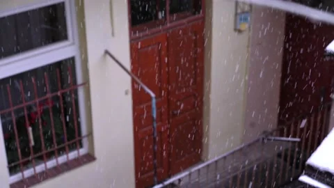 Old building during heavy snowfall, Europe Video stock 231547118