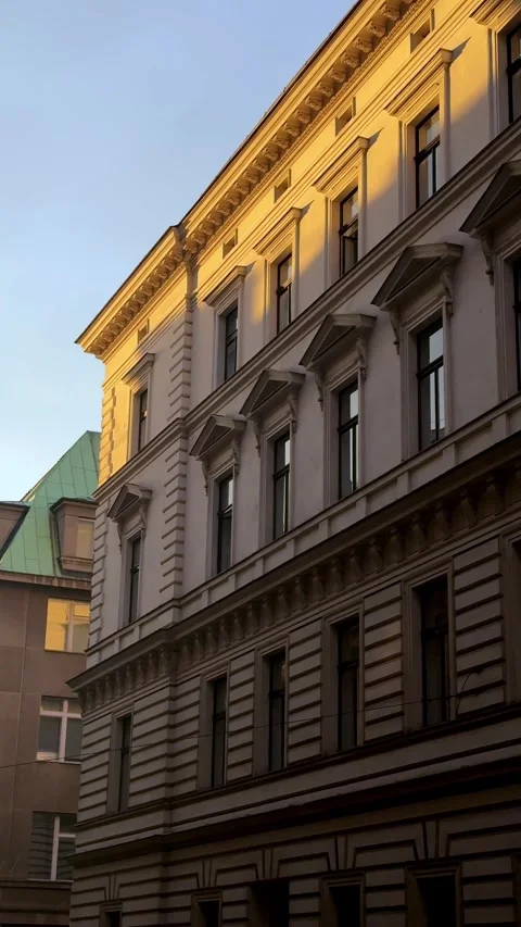 Old building facade, intricate architectural detail, European structure, urban Stock Footage 333110712