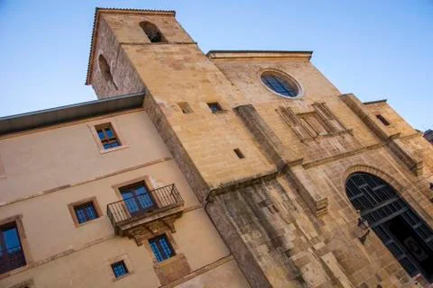 Old building facde with several windows and sky Foto stock