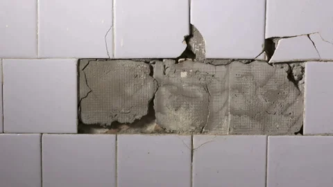 Old building interior some of tiles in the kitchen are falling off from the wall 스톡 동영상 94099987