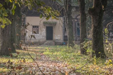 Old building in park at the fall time, rustic and falling apart from elapsed  Fotos de archivo