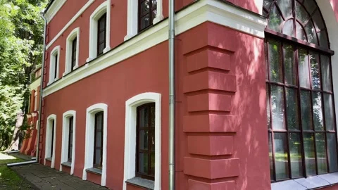 An old building in the park with large windows Video stock 329091369