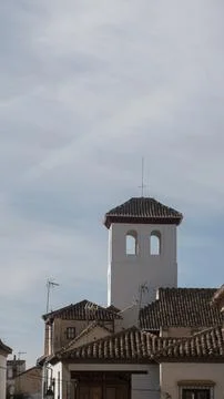 Old building with a tower and windows in Granada Stock Photos