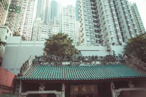 Old building with trees facing streets in Hong Kong Stock-Fotos