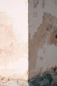Old building wall with rubbed plaster Stock Photos