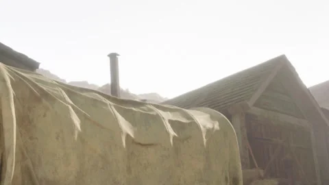 Old buildings and a covered wagon on a sunny day Stock Footage 342051297