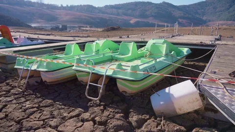 Old buildings emerging from empty swamp due textreme dryness in Spain. Stock Footage 265306099