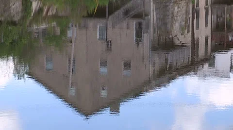 Old buildings reflections in the water Stock Footage 47741226