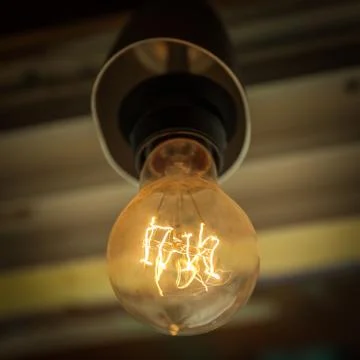 The old bulb on the ceiling of the old caffe Stock-Fotos