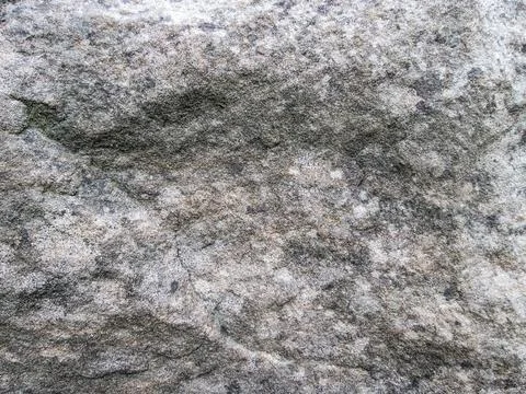 Old bumpy stone with irregularities. Grainy texture for design. Foto stock