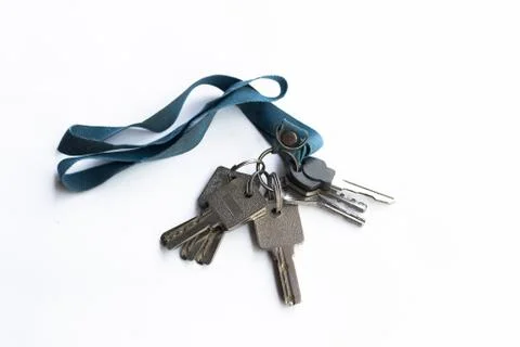 Old Bunch of key With neck strap blue color on white background. Stock Photos