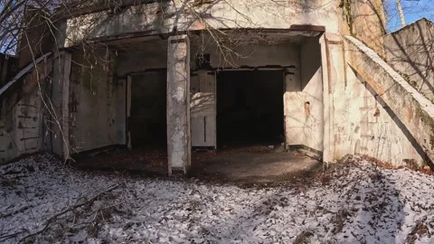 An old bunker for storing nuclear missiles in the forest during the Cold War Stock Footage 295808725