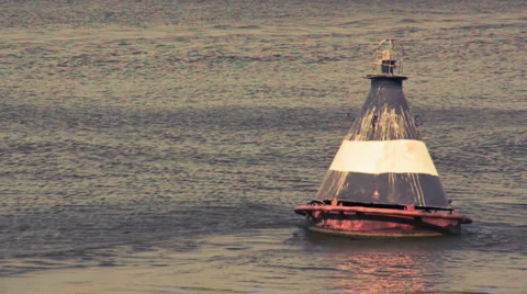 Old buoy swinging on the river Stock Footage 5088967
