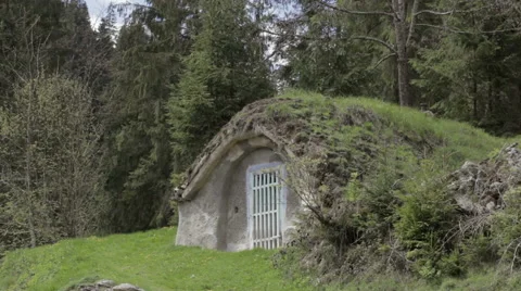 Old burrow under a hill Stock Footage 62775325