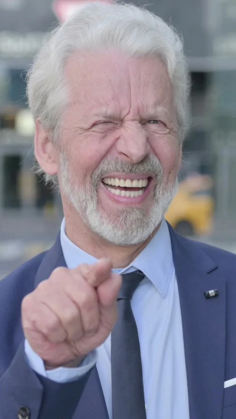 Old Businessman Pointing at the Camera while Standing Outdoor, Vertical Video Vídeo Stock 339671905