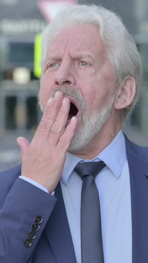 Old Businessman Yawning while Standing Outdoor, Vertical Video Vídeo Stock 339671771