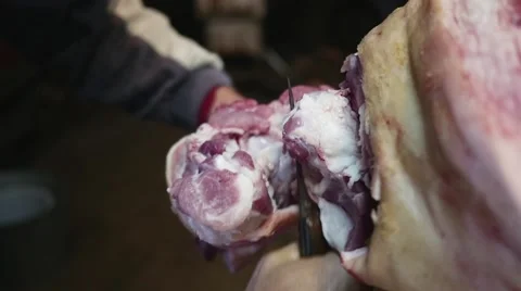 Old butcher cutting meat with knife in slow motion Stock Footage 44288071