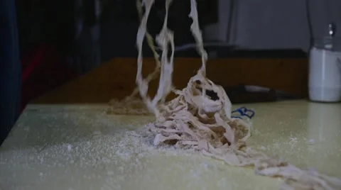 Old butcher preparing intestines to be filled up in slow motion Stock Footage 44296092