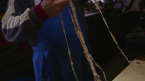 Old butcher preparing intestines to be filled up in slow motion Stock Footage 44296667