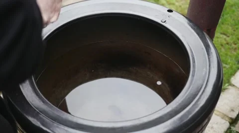 Old butcher throwing meat into big pot in slow motion Stock Footage 44290284