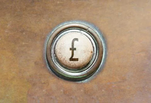 Old button - british pound Stock Photos