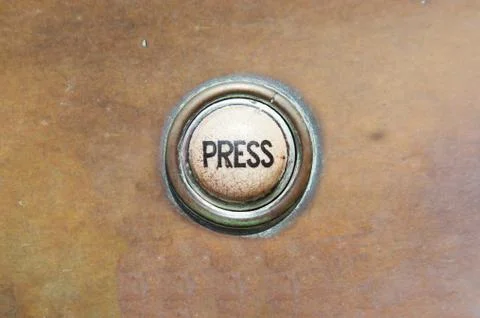 Old button - press Stock Photos