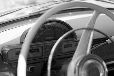 Old cabin, console and steering wheel in a vintage retro car. Shallow focus.  스톡 사진