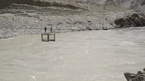 Old cable car over a mountain river in the Ladakh region india Видео 310806742