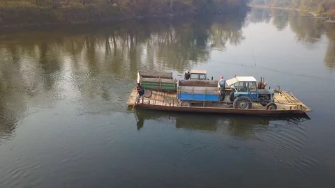 Old cable ferry on the river in rural countryside Stock Footage 121655333