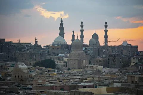 Old Cairo skyline at sunset, view of old and Coptic Cairo from the bridge, Egypt Stock Photos