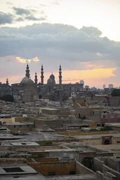 Old Cairo skyline at sunset, view of old and Coptic Cairo from the bridge, Egypt Stock Photos