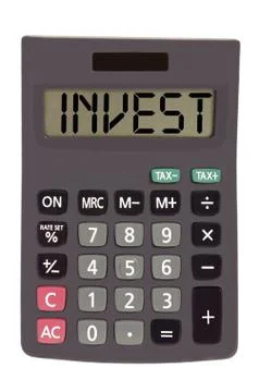 Old calculator on white background showing text "invest" Illustrazione stock