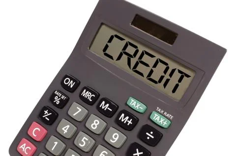 Old calculator on white background showing text "credit" in perspective Illustrazione stock