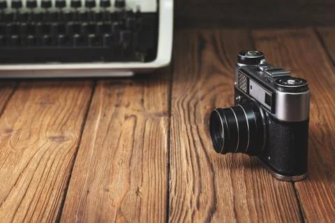 Old camera and typewriter Stock Photos