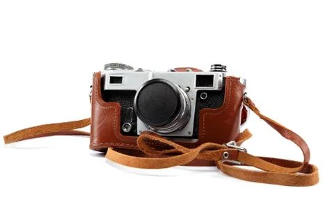 Old camera with case isolated on white background. Stock Photos