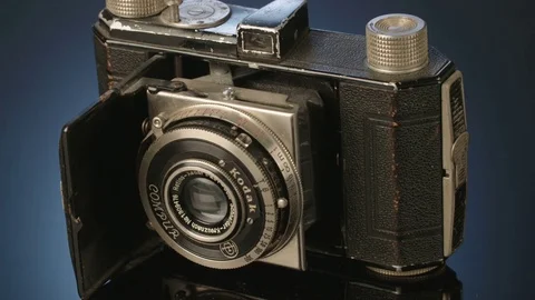 Old camera on dark background Video stock 71632971