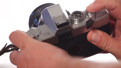 Old camera in hands 35 mm film Stock Footage 93460682