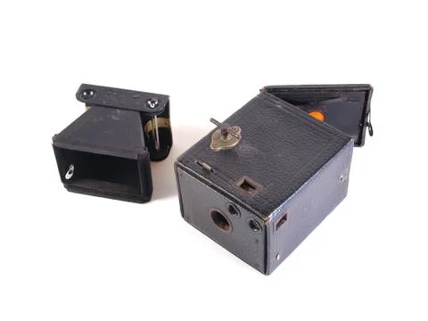 Old camera on a plain white background. Stock Photos