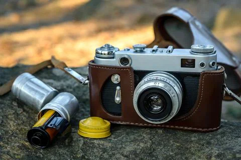 Old camera on the stone Stock Photos