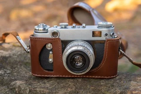 Old camera on the stone Stock Photos