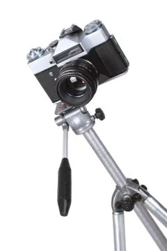 Old camera on tripod Stock Photos