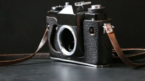 Old camera under the film without a lens. Stock Footage 101244684