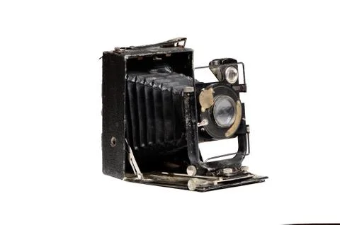 Old camera on the white background Stock Photos