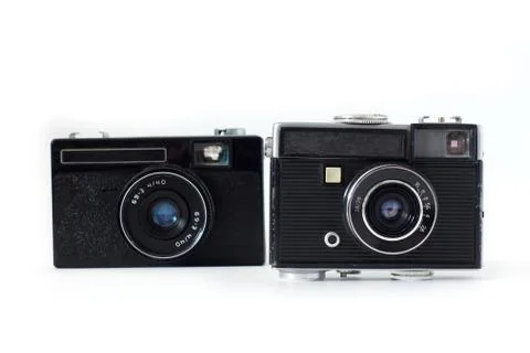 Old camera on white background . Stock Photos