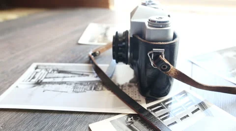 Old camera on a wooden table Stock Footage 53850045