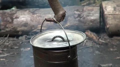 Old camp pot hanging over the fire Stock Footage 63632110