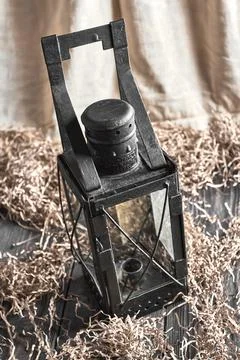 Old candle lantern in the interior Stock Photos