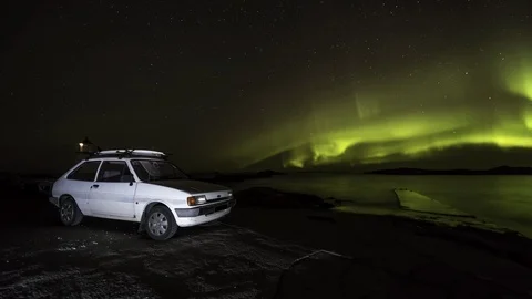 Old car with Aurora Stock Footage 99608182