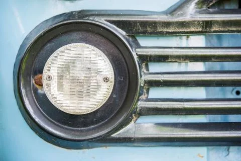 Old car with close-up on headlights Fotos Stock