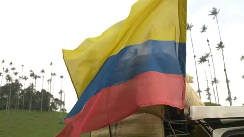 Old car with the colombian flag in the Cocora Valley Stock Footage 200860582